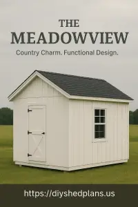 The Meadowview shed with classic board and batten siding, steeply pitched roof, and a window letting in natural light, set in a garden landscape.